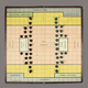 The complete game board. Note the spaces for the hospital and prison, and how everything else is portrayed as the very gladiatorial “ARENA”.